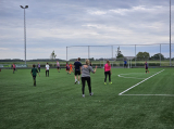 Laatste training S.K.N.W.K. JO11-1JM (partijtje tegen de ouders) van maandag 27 mei 2024 (29/137)